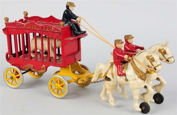 CAST IRON OVERLAND CIRCUS HORSE-DRAWN CAGE WAGON. 