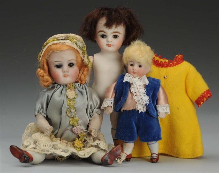 LOT OF 3 GERMAN ALL BISQUE DOLLS.                 