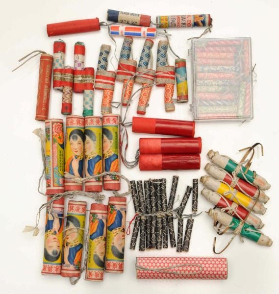 LOT OF APPROXIMATELY 30 FIRECRACKER PIECES.       