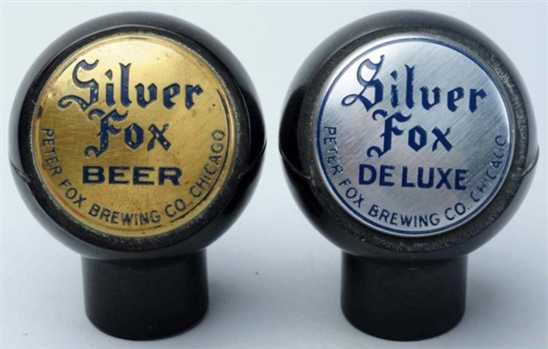 LOT OF 2: SILVER FOX BEER TAP KNOBS.              
