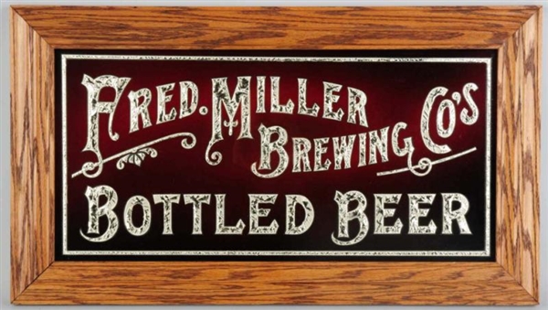 FRED MILLER BREWING CO. REVERSE GLASS SIGN.       