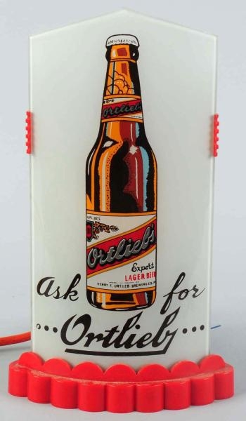 ORTLIEB BEER REVERSE GLASS LIGHT-UP BULLET SIGN.  