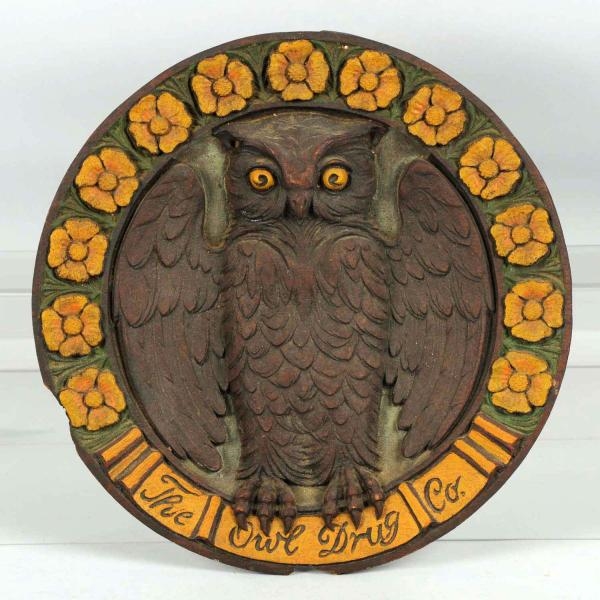 THE OWL DRUG COMPANY ADVERTISING SIGN.            