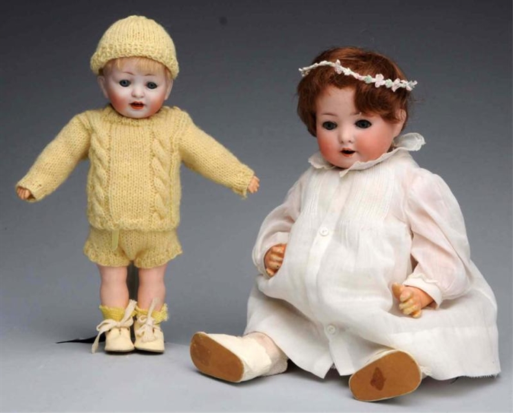 LOT OF 2: BISQUE CHARACTER DOLLS.                 