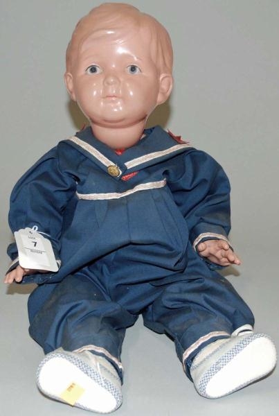 CELLULOID BABY IN BLUE SAILOR OUTFIT.             
