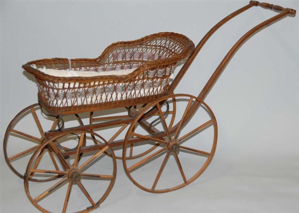 DOLL WICKER BABY CARRIAGE.                        