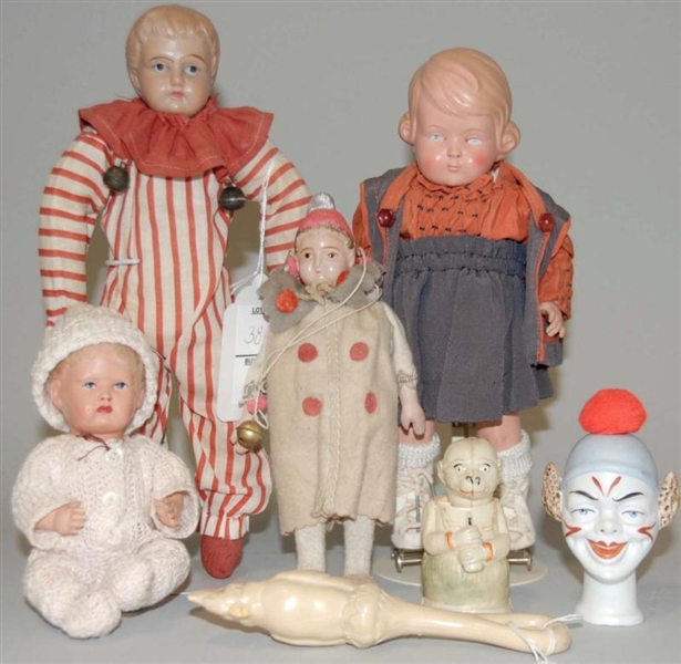 FIVE DOLLS AND TWO CELLULOID TOYS.                