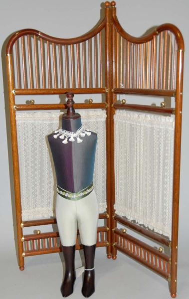 MANNEQUIN AND WOODEN DRESSING CURTAIN.            