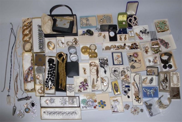 LARGE LOT OF ASSORTED COSTUME JEWELRY.            