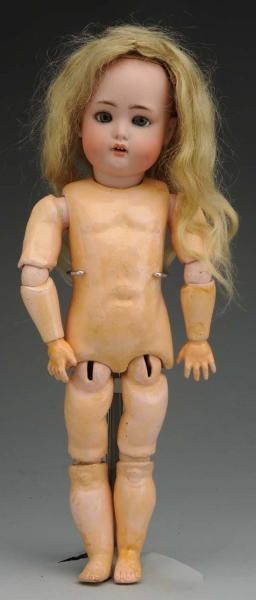 DESIRABLE GERMAN BISQUE CHARACTER DOLL.           