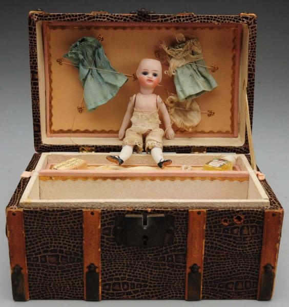 DAINTY FRENCH-TYPE ALL-BISQUE DOLL IN TRUNK.      