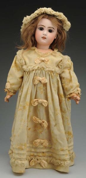 DRAMATIC FRENCH BISQUE BÉBÉ DOLL.                 
