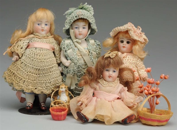 LOT OF 4: GERMAN ALL-BISQUE DOLLS.                