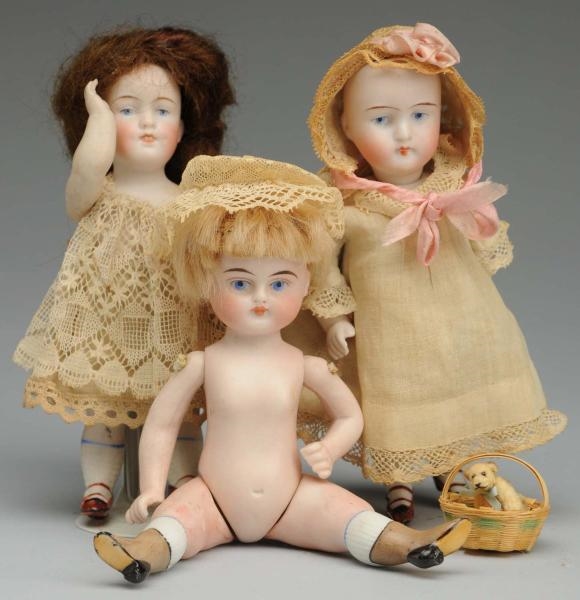 LOT OF 3: GERMAN ALL-BISQUE DOLLS.                