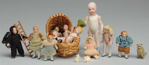 LOT OF TINY GERMAN ALL-BISQUE DOLLS.              