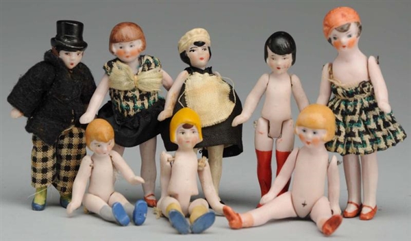 LOT OF 8: ALL-BISQUE DOLLS.                       