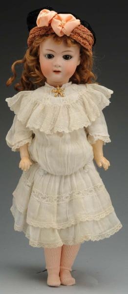PERKY GERMAN BISQUE CHARACTER DOLL.               