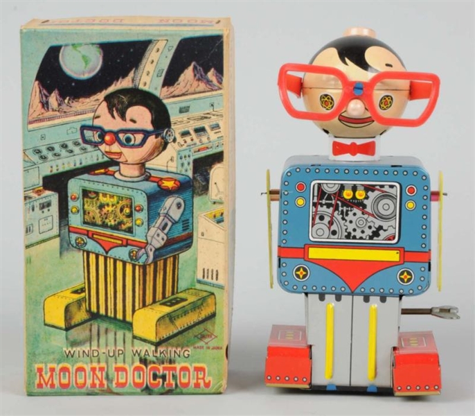 TIN LITHO & PLASTIC WIND-UP MOON DOCTOR.          