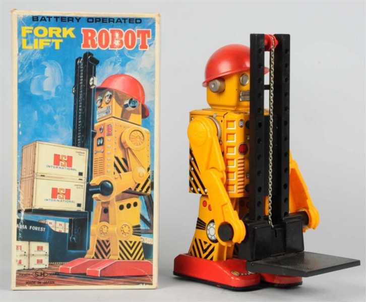 TIN LITHO BATTERY-OPERATED FORKLIFT ROBOT.        