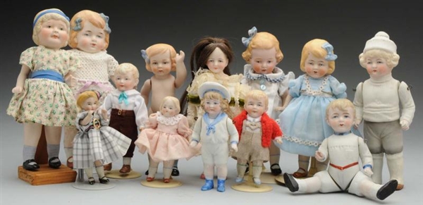 LOT OF 13: ALL-BISQUE DOLLS.                      