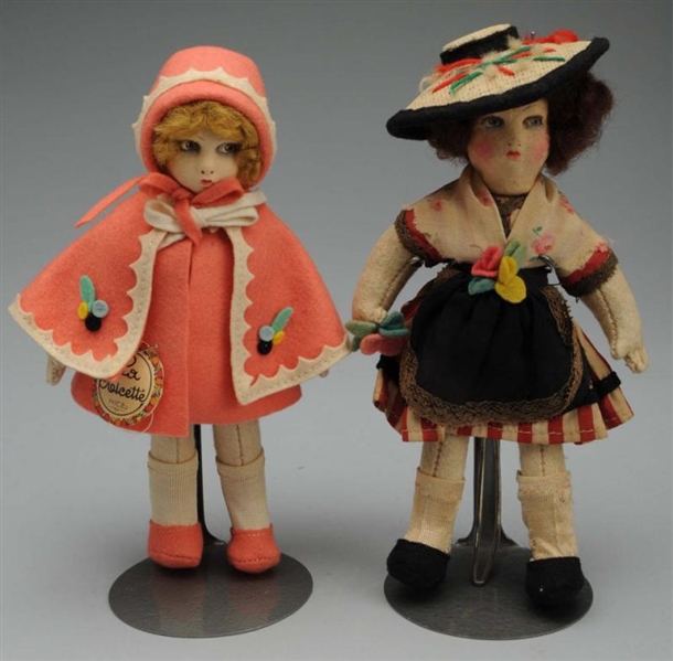 PAIR OF FRENCH CLOTH DOLLS.                       