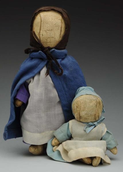 LOT OF 2: AMISH OILCLOTH DOLLS.                   