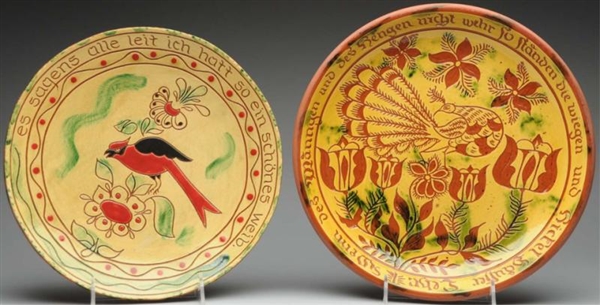 PAIR OF LESTER BREININGER REDWARE CHARGERS.       