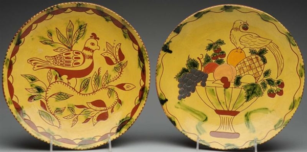 PAIR OF LESTER BREININGER SLIP-DECORATED CHARGERS 