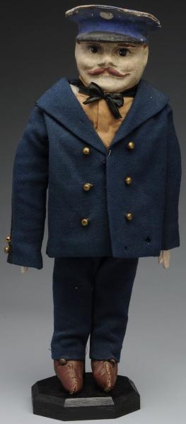 POLICE OFFICER DOLL/BANK.                         