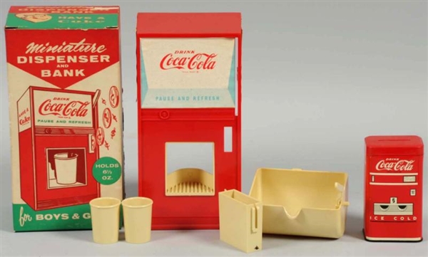 LOT OF 2: COCA-COLA TOY BANKS.                    