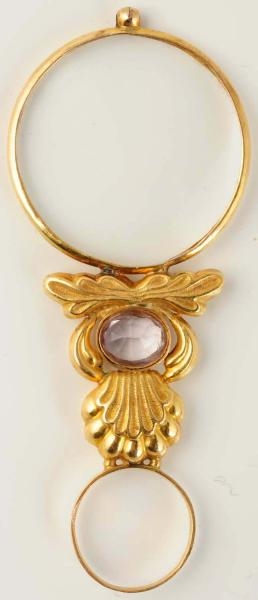 18K YELLOW GOLD MAGNIFIER WITH OVAL KUNZITE.      