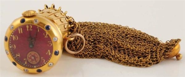 14K YELLOW GOLD CHANGE PURSE WITH WATCH TOP.      