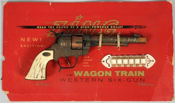 WAGON TRAIN WESTERN SIX-GUN ON CARDBOARD.         