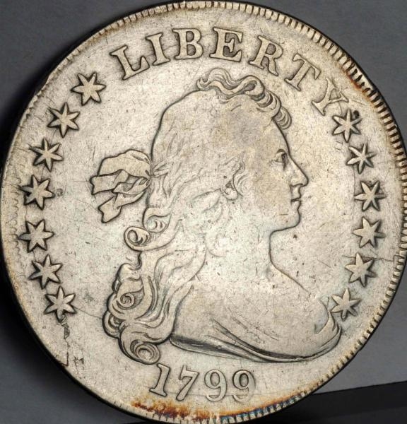 1799 DRAPED BUST SILVER DOLLAR VF.                