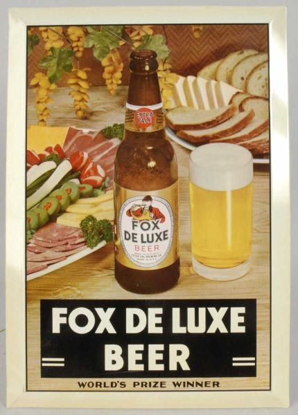 FOX DELUXE BEER TIN OVER CARDBOARD SIGN.          