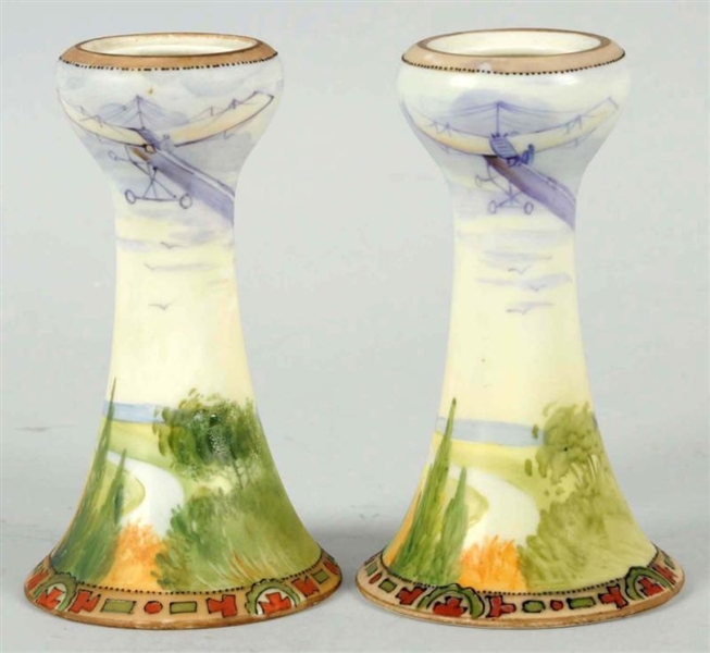 PAIR OF HAND-PAINTED NIPPON CANDLESTICKS.         