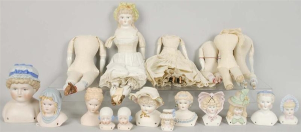 LOT OF REPRODUCTION ARTIST DOLL HEADS.            