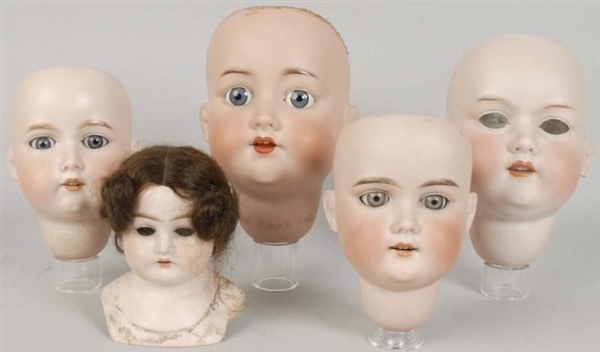 LOT OF 5: GERMAN BISQUE DOLL HEADS.               
