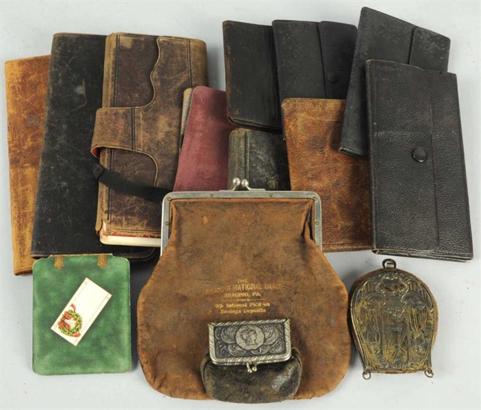 LOT OF 13: EARLY LEATHER WALLETS.                 