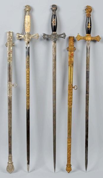 LOT OF 3: CEREMONIAL SWORDS.                      