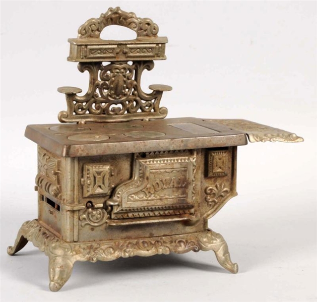 CHILDS CAST IRON STOVE BY ROYAL.                 