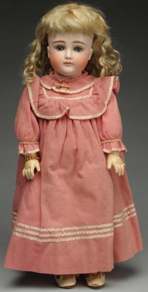 EXQUISITE POUTY KESTNER CHILD DOLL.               