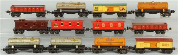 LOT OF 12: LIONEL 2600 SERIES FREIGHT TRAIN CARS. 