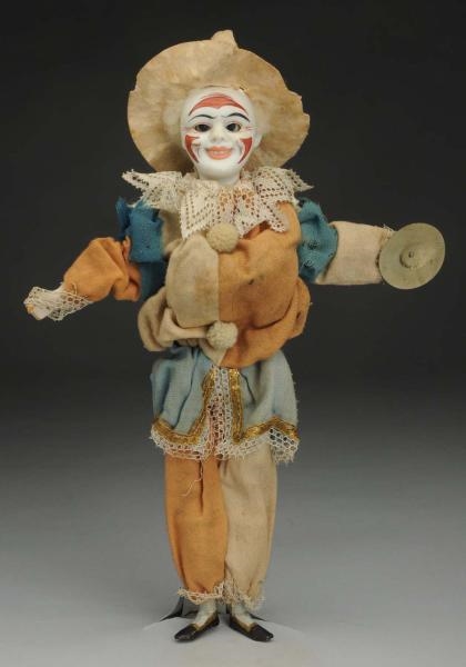 CLAPPING CLOWN TOY.                               