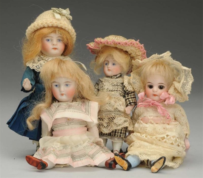 LOT OF 4: GERMAN ALL-BISQUE DOLLS.                