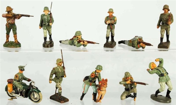 LOT OF 11: DAMAGED COMPOSITION SOLDIERS.          