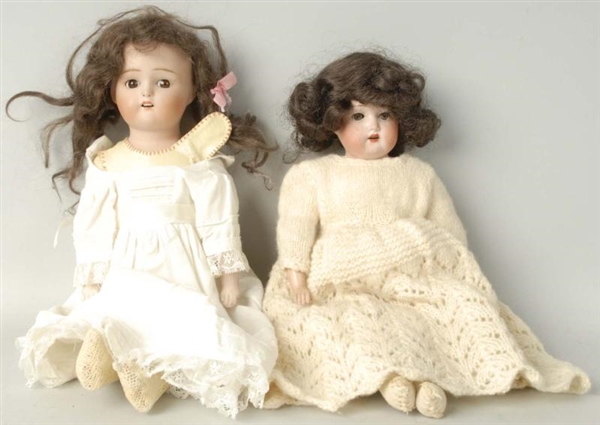 LOT OF 2: SMALL BISQUE HEAD DOLLS.                