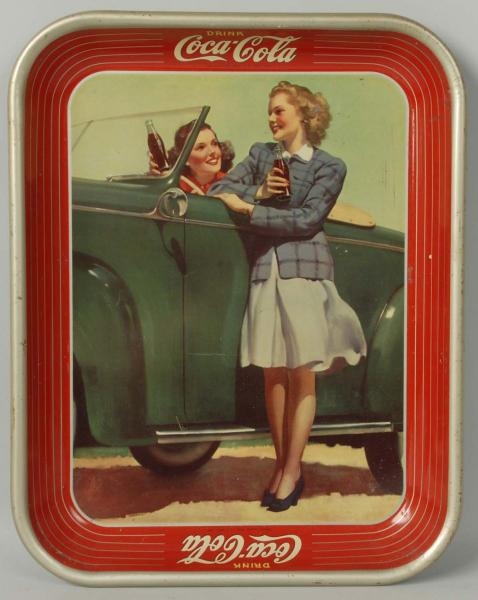 1942 COKE SERVING TRAY WITH GIRLS BY CAR.         