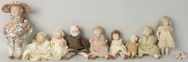 LOT OF 9: ALL BISQUE DOLLS.                       
