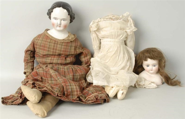 LOT OF 2: BISQUE & CHINA DOLLS.                   